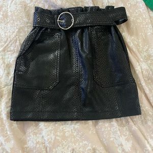 black leather skirt with a belt included